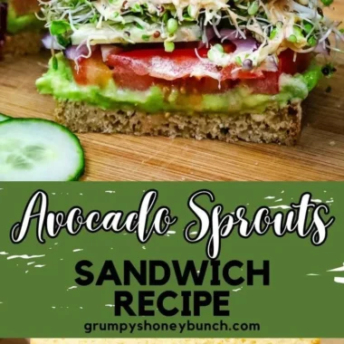 Avocado sprouts sandwich with fresh ingredients on a wooden table.