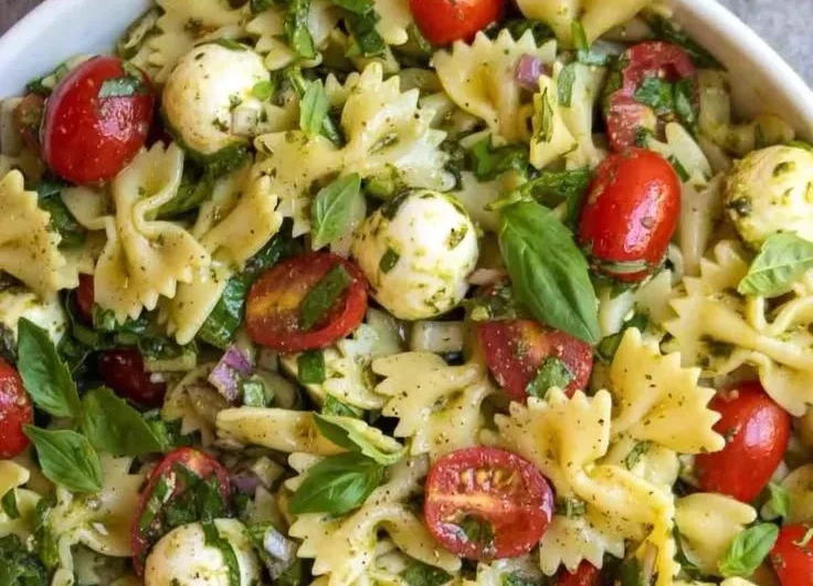 Colorful Bow Tie Pasta Salad featuring vegetables and dressing