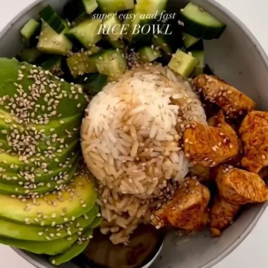 Healthy rice bowl with vegetables and protein for a nutritious meal.