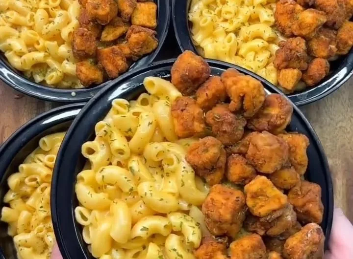 High-protein KFC Chicken Mac & Cheese served in a bowl with garnish