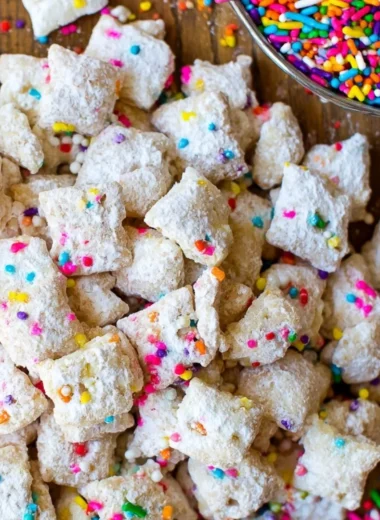 Delicious Cake Batter Puppy Chow snack recipe with vibrant colors and toppings