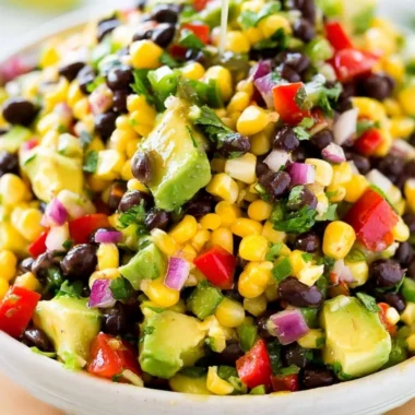 Delicious cowboy caviar served in a bowl with colorful vegetables