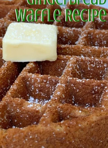 Delicious gingerbread waffles topped with syrup and whipped cream