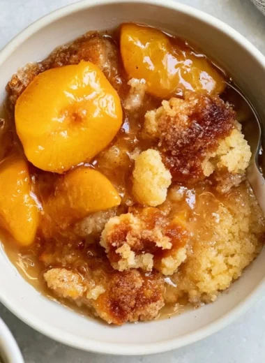 Delicious Southern peach cobbler with fresh peaches and a golden crust