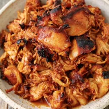 Instant Pot BBQ pulled chicken served with buns and coleslaw