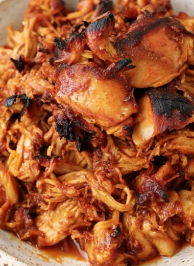 Instant Pot BBQ pulled chicken served with buns and coleslaw