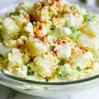 Delicious bowl of the best potato salad with egg, ready to be enjoyed.