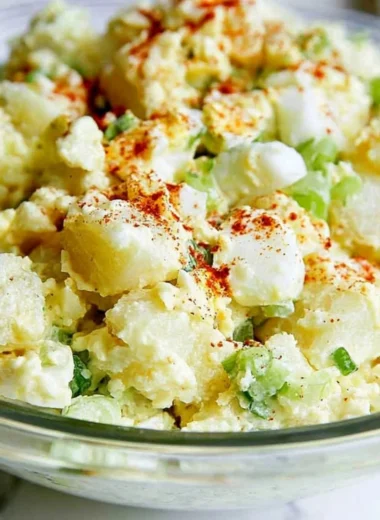 Delicious bowl of the best potato salad with egg, ready to be enjoyed.