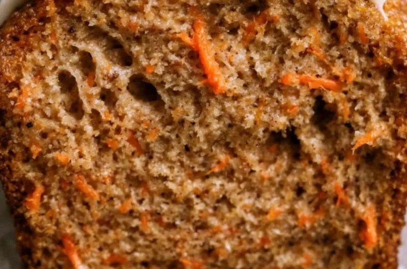 Cozy carrot cake loaf with cream cheese frosting and walnuts