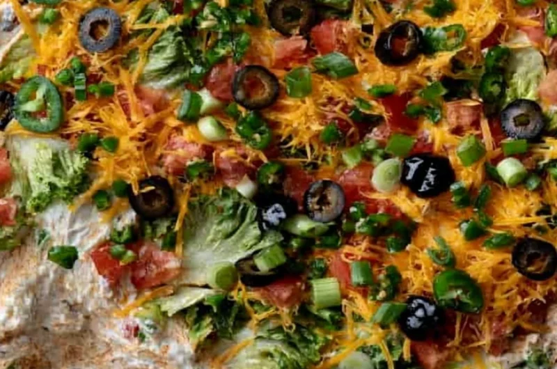 Cozy cottage cheese taco dip served in a bowl with tortilla chips