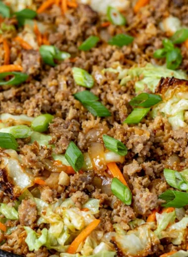A colorful and healthy Egg Roll in a Bowl served in a rustic dish.