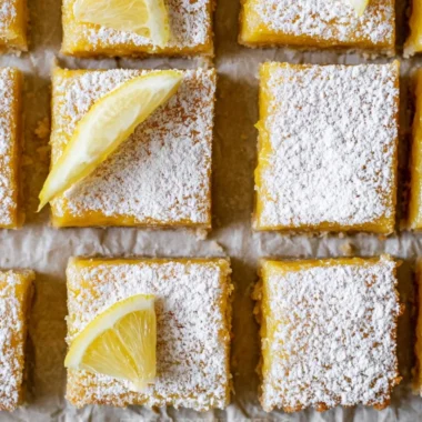 Delicious homemade super easy lemon bars on a white plate