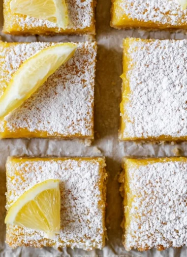 Delicious homemade super easy lemon bars on a white plate