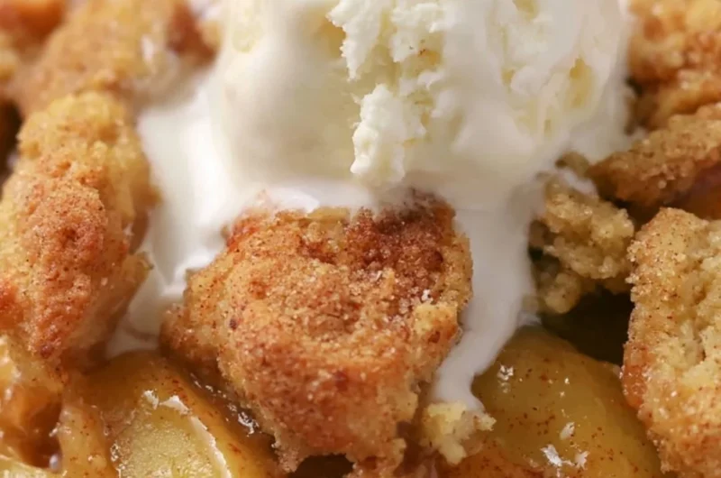 Delicious homemade apple cobbler with a golden crust and juicy apple filling.