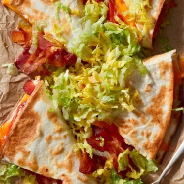 Delicious BLT quesadillas with bacon, lettuce, and tomato melted in a crispy tortilla