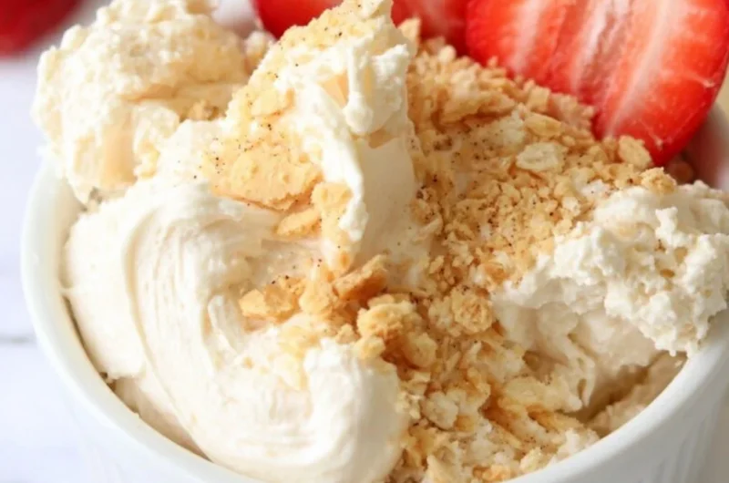 High protein cheesecake dip served in a bowl with dipping options