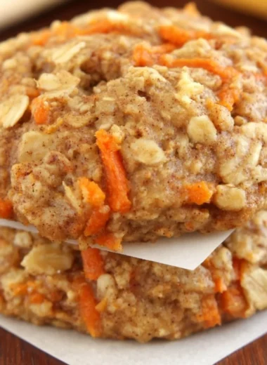 Healthy carrot cake oatmeal cookies with nuts and spices on a wooden table