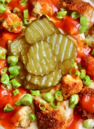 Nashville Hot Chicken Dip served in a bowl with tortilla chips
