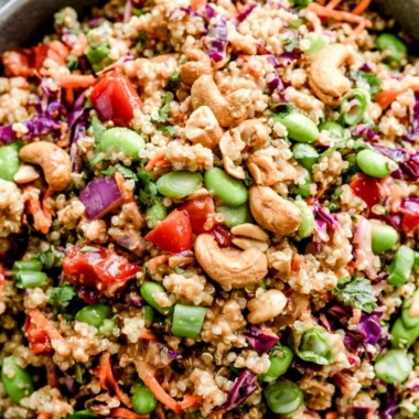 Colorful Thai Quinoa Salad with vegetables and herbs served in a bowl