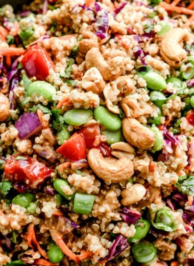 Colorful Thai Quinoa Salad with vegetables and herbs served in a bowl